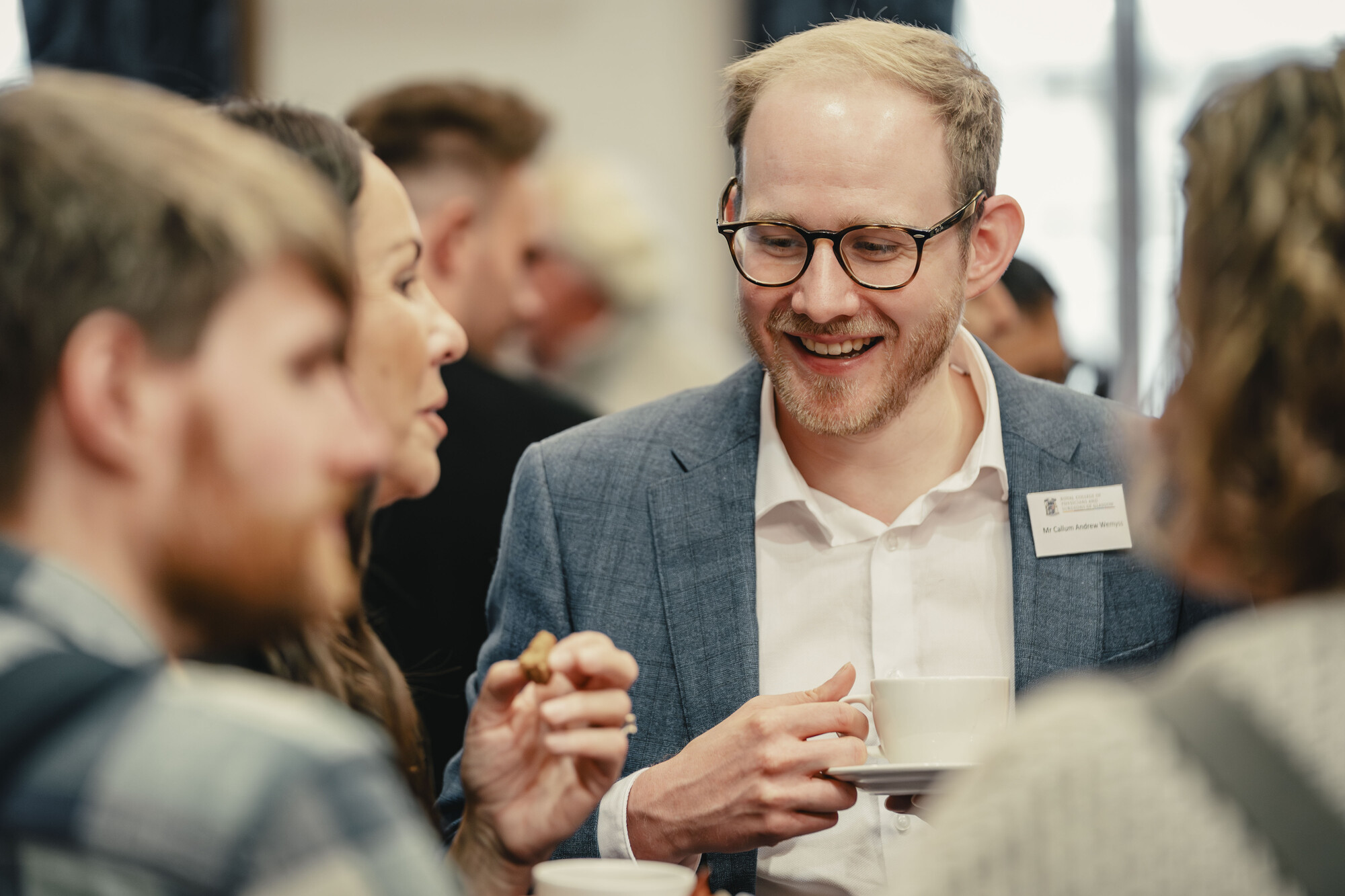 Delegates networking during coffee break